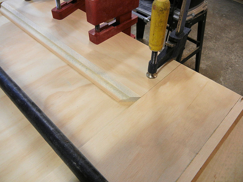 Flattening the end of the rod.